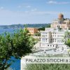 Vista sul mare con Palazzo Sticchi e cupola.